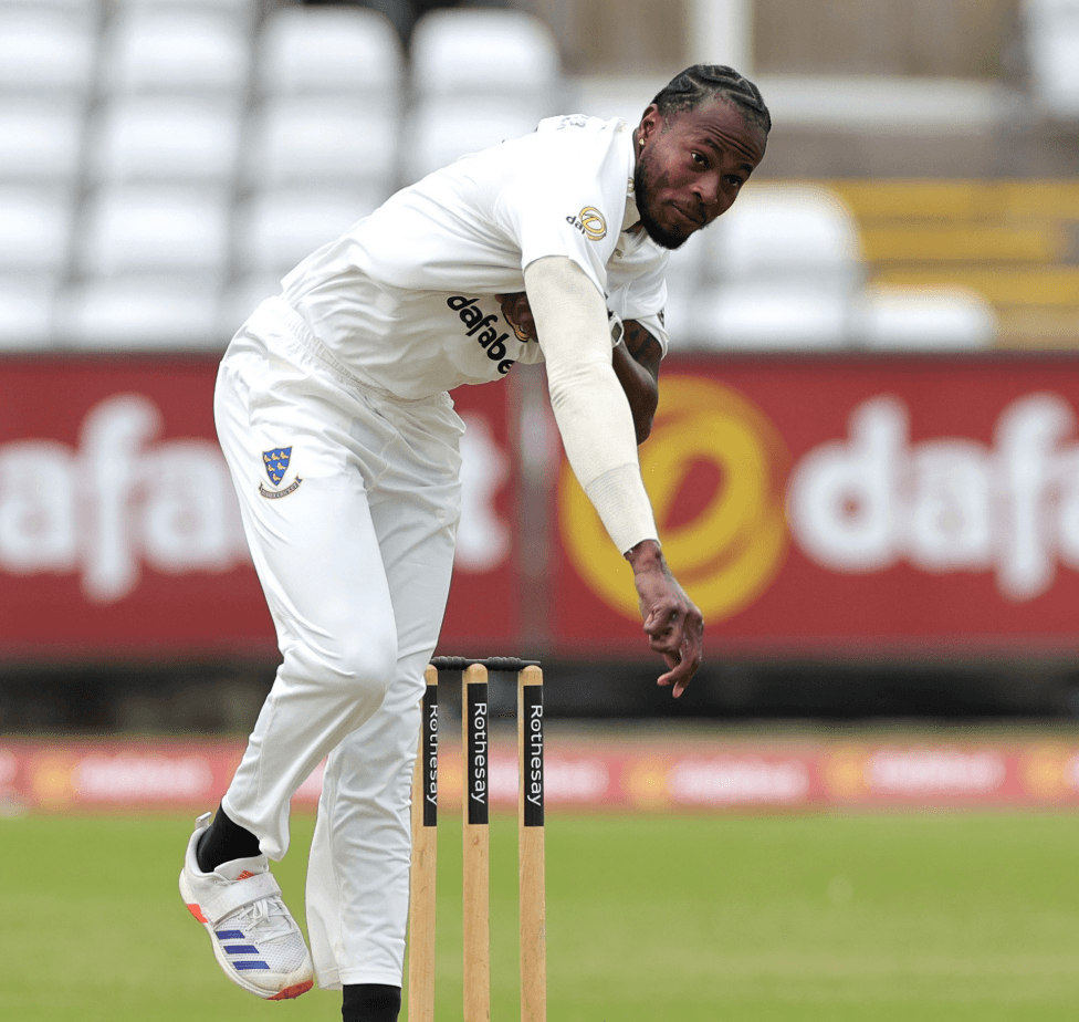 Jofra Archer wearing black socks